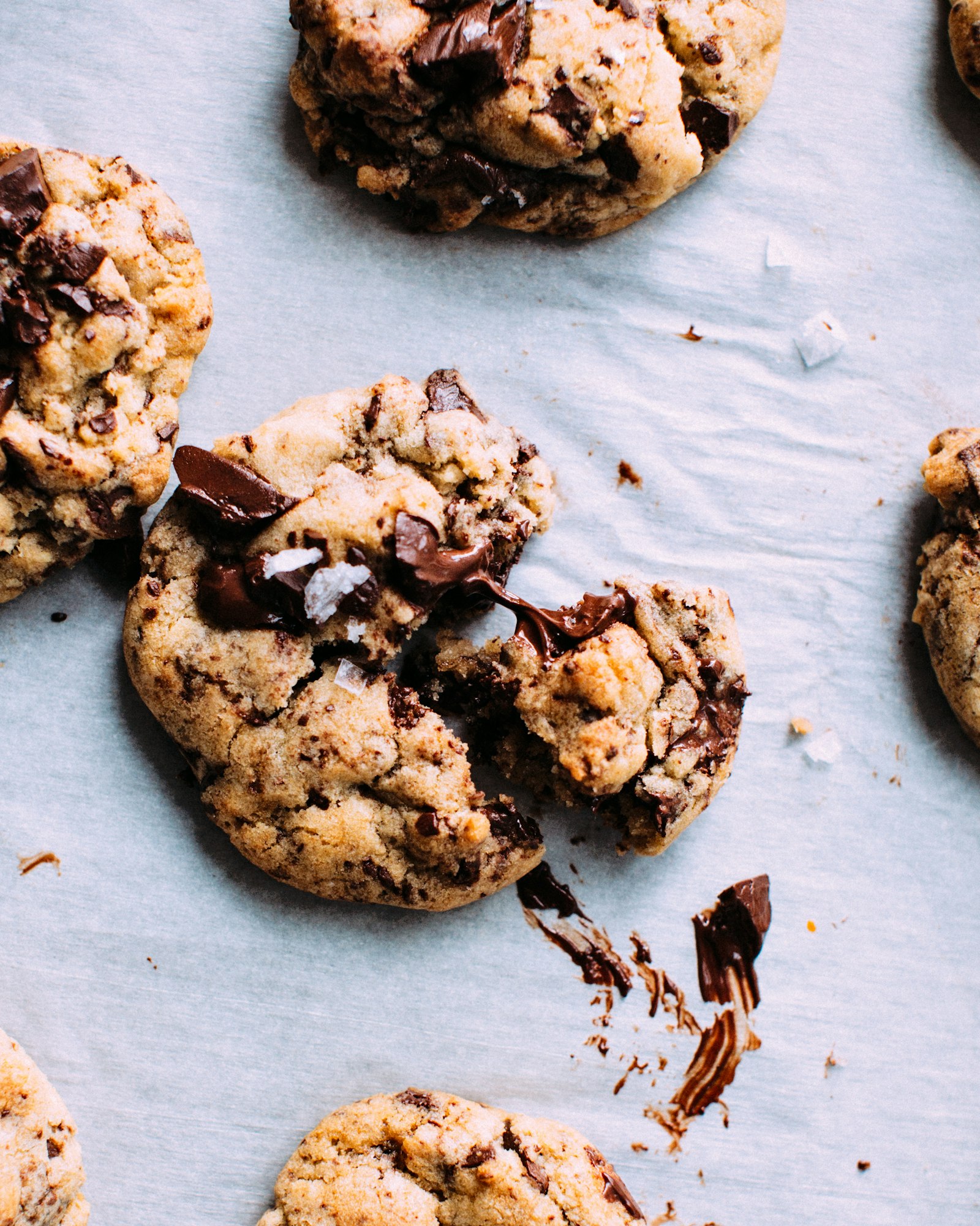 Bakery style chocolate chip cookies on a cooling rack